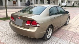 Cần bán xe Honda Civic 2010 số tự động bản full option,màu vàng cát 