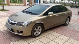 Cần bán xe Honda Civic 2010 số tự động bản full option,màu vàng cát 