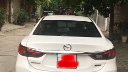Bán xe Mazda 6 2.0 đời 2016, màu trắng, giá: 690 triệu.