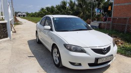Cần bán xe Mazda 3 1.6 số sàn năm 2007, màu trắng, đã đi 120.000km
