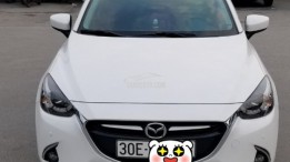 BÁN xe Mazda2 hatchback màu trắng, đăng ký 12/2016, đã đi 60.000 km.