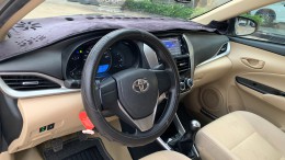 Cần bán xe TOYOTA VIOS 1.5E 2019 màu vàng cát xe đi lướt chính hãng Toyota Sure