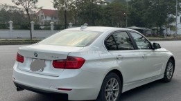 Bán xe BMW 320i 2014 trắng ngọc trai