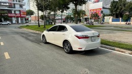  Cần Bán xe Toyota Altis 2019 full AT 1.8, màu trắng. xe gia đình, ít chạy, trùm mềm, bảo dưỡng hãng đều đều.