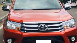 Gia đình cần bán xe Toyota Hilux 2019, số sàn, màu cam thể thao, gia đình sử dụng, odo 87.000km. sơn zin nhiều.