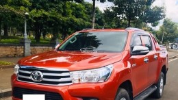 Gia đình cần bán xe Toyota Hilux 2019, số sàn, màu cam thể thao, gia đình sử dụng, odo 87.000km. sơn zin nhiều.